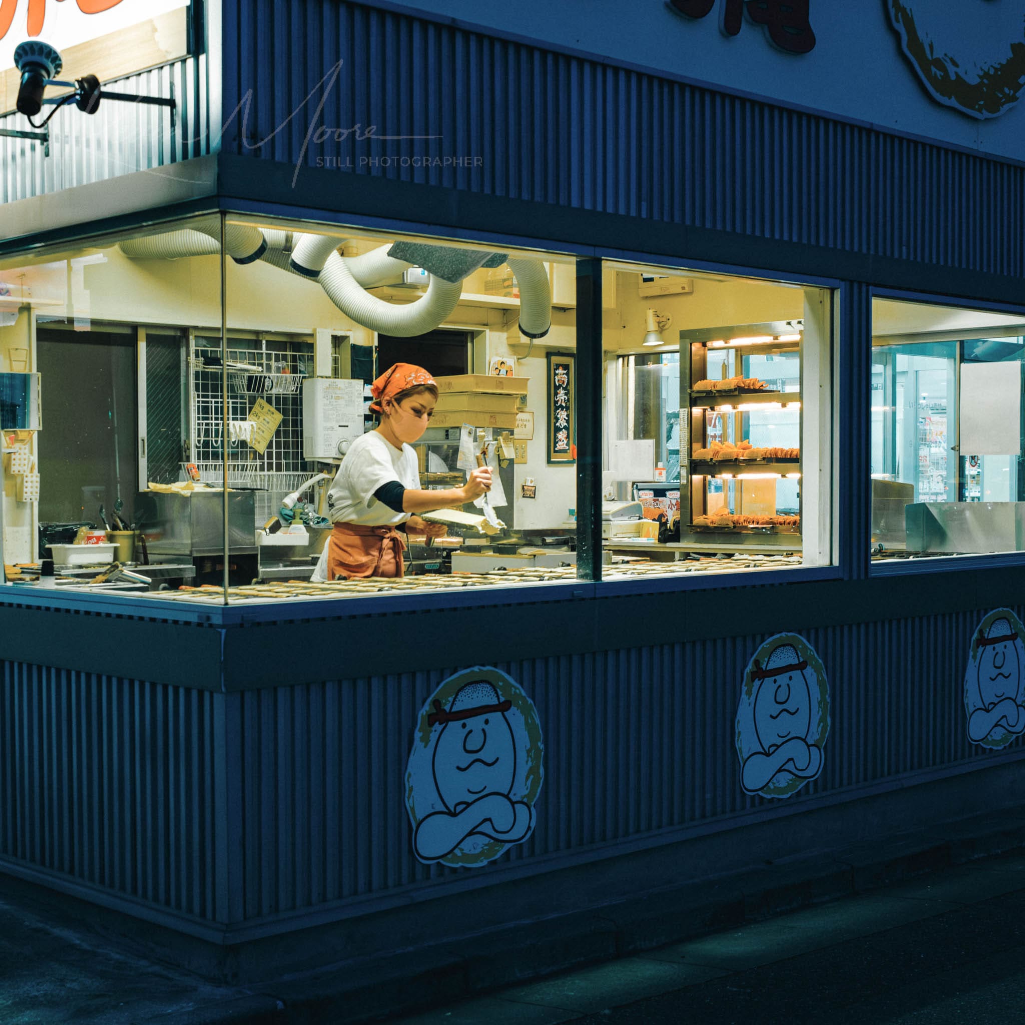 Evening bakery scene showing employee preparing food in a vintage-style, family-friendly diner.