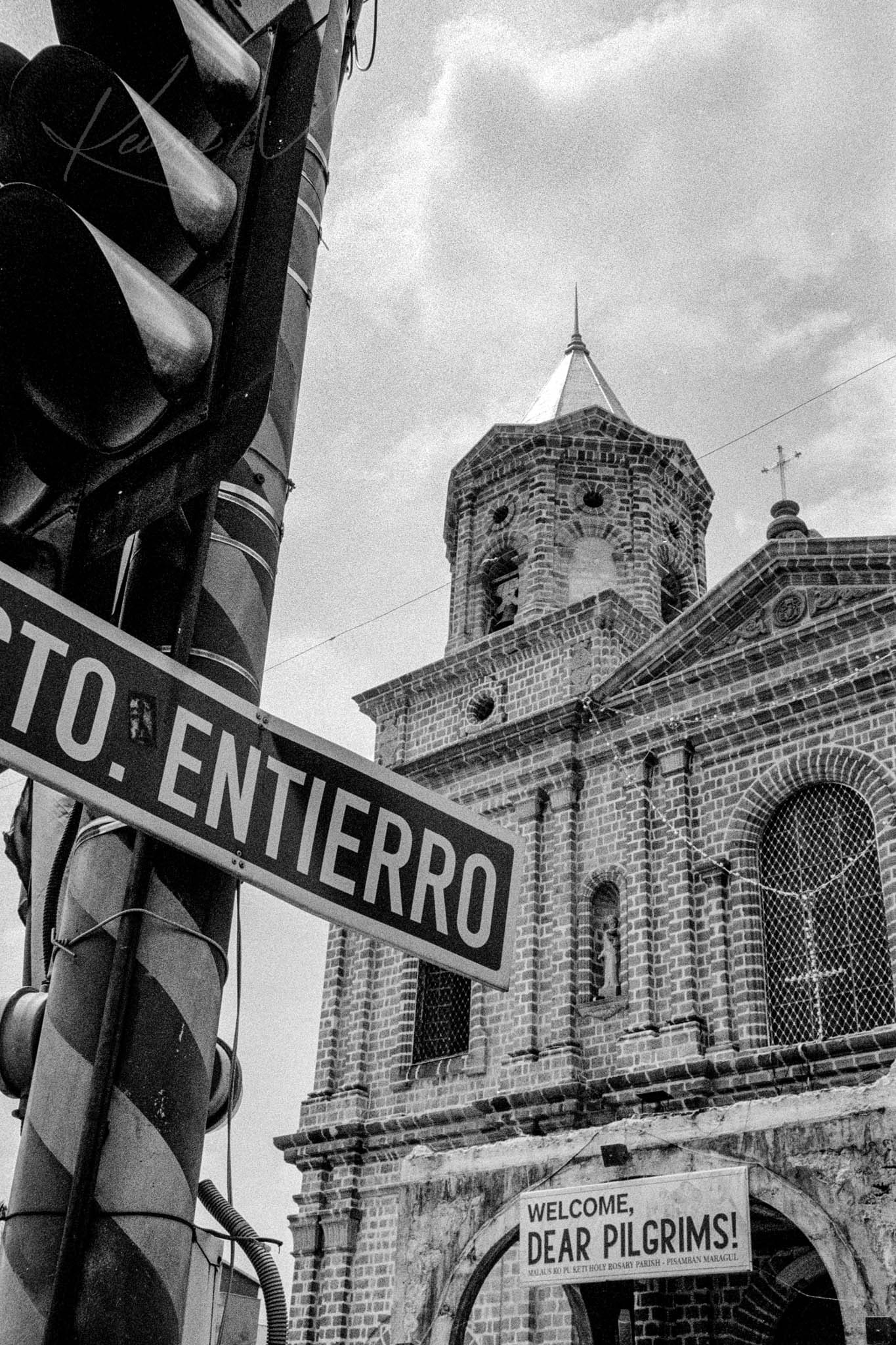 Monumental Gothic Church and Pilgrimage Signage in Philippines in Black and White Photography