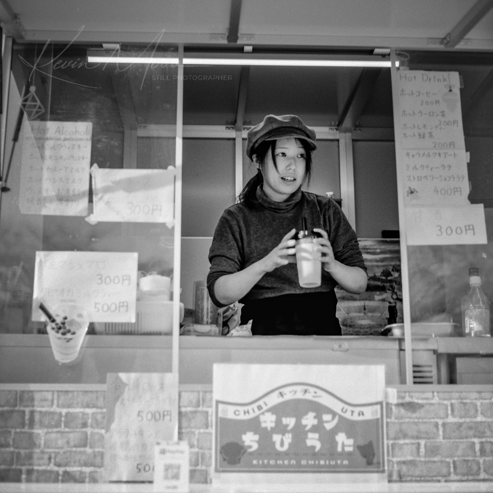 Japanese food stall with lively staff